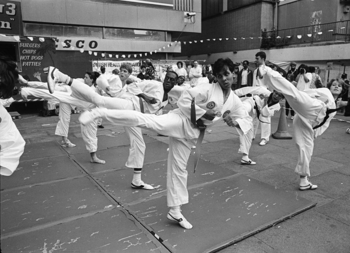 SwkHeritage's tweet photo. This week's #ArchivesExercise regime is inspired by the Phil Polglaze archive. Were you there for this Tae Kwon Do demonstration at #ElephantandCastle shopping centre in 1993?
If trying this one at home, don't get to near the mantelpiece.
#ArchivesAtHome
#StayinWorkOut https://t.co/H9nzt2UH4f