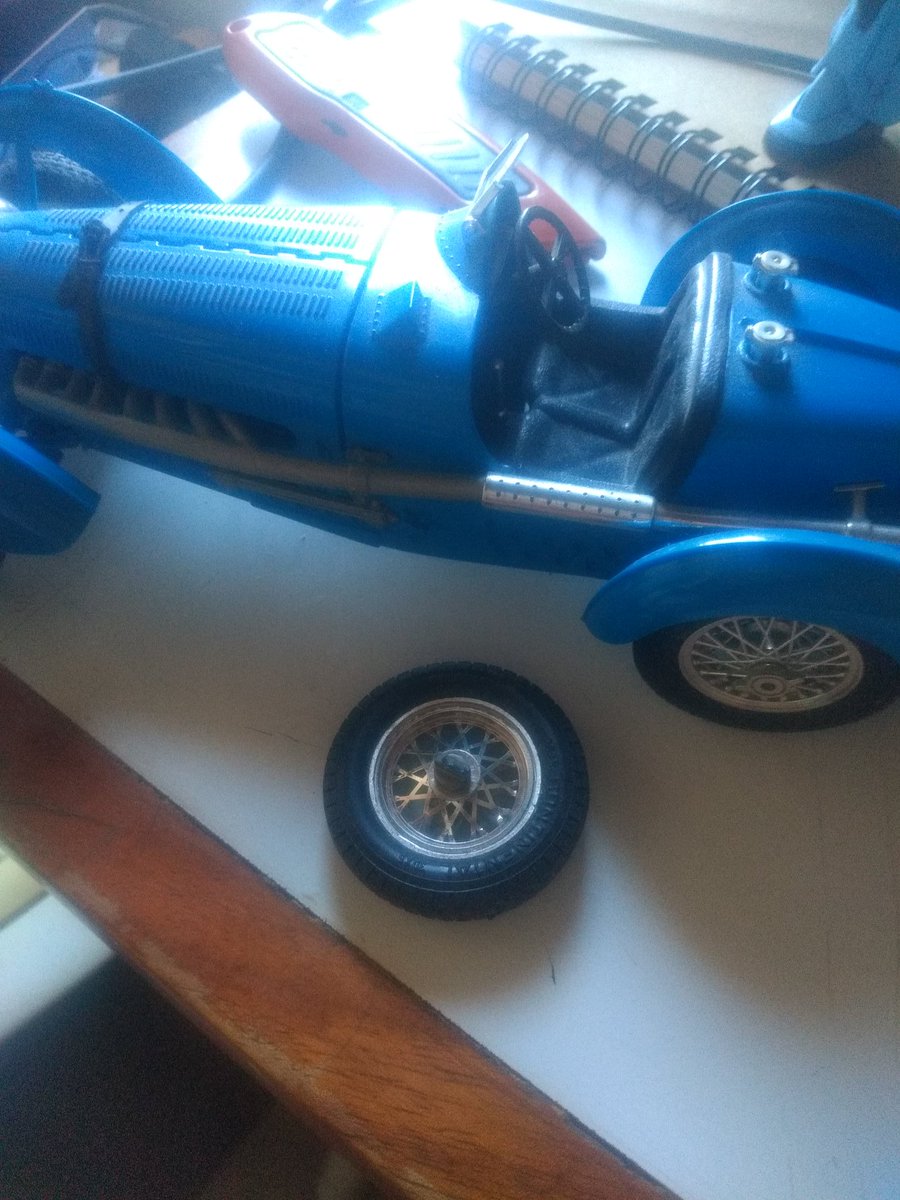 I wanted to glue my Bugatti Type 59 but the wheel's weight is too much for the glue. Have to break out the epoxy
