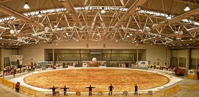 15. The world's biggest pizzaChefs in Rome cooked up the world’s largest gluten-free pizza, named 'Ottavia'. It weighs 50,000 pounds and is the size of an Olympic swimming pool. Apparently, it had 5 tonnes of tomato sauce and 4.4 tonnes of mozzarella cheese.