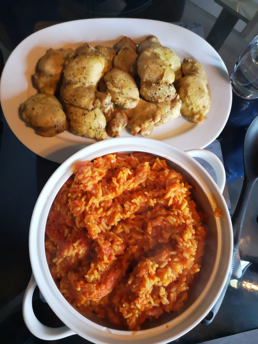 gilessumner's tweet photo. Well that really rather wonderful... Adobo seasoned chicken thighs with jollof rice... Gloriously spicy, a warm duvet of flavour... Bravo... #foodheaven #isolationgrub #givemesomeroom https://t.co/dNRoHPT8eJ