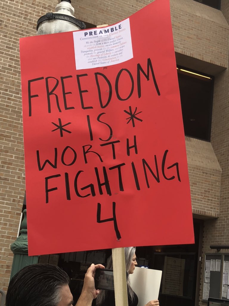 CaryCheshireTX's tweet photo. A couple signs from the #ReOpenTX rally here in Laredo. #txlege https://t.co/vDqXhHTnF5