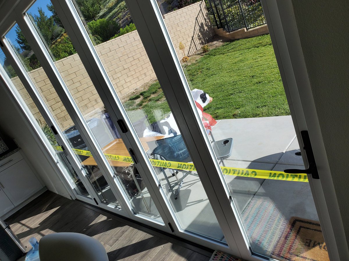 Caution tape is being deployed all around our house including across the back door. A serious team of  @Tesla energy employees are going full steam on this project. Side note, yes that is a cow lawn ornament my daughter wanted for Christmas this year. 
