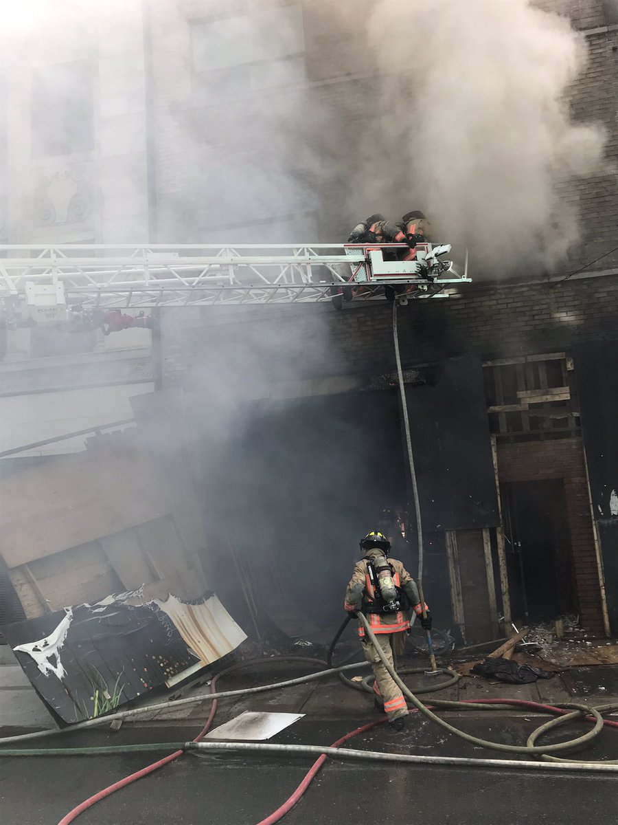 HamiltonFireDep's tweet photo. Crews are active at a multiple alarm at 21 John St. S. #StrongForYou @cityofhamilton @hamiltonfire288 https://t.co/KmgVtZIfmW