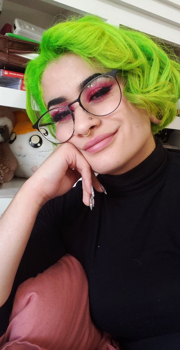 November to February I went neon green! The purple hair ended up having alot of emotional baggage attached to it. It was the "breakup" hair color and a bad reminder of truama. So I went as dramatic as possible new clean slate,since green reps peace and renewal.