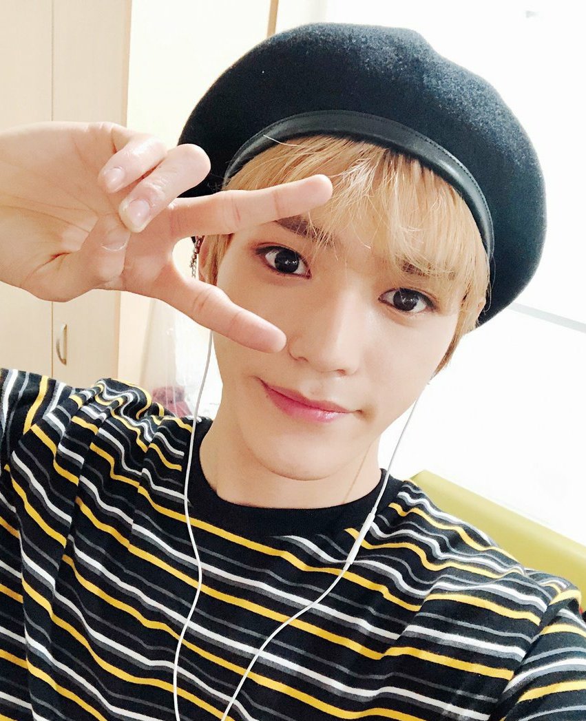 a mini thread of taeyong in a beret, just because he& #39;s cute