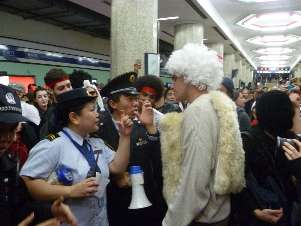 China pic, day 18:Negotiating with the subway police, Halloween 2012.Every Halloween night there was a massive costume party on Line 2 subway in Beijing. In 2012, I was dressed as cartoon sheep 喜羊羊 and stumbled into the role of negotiating on behalf of the subway party.