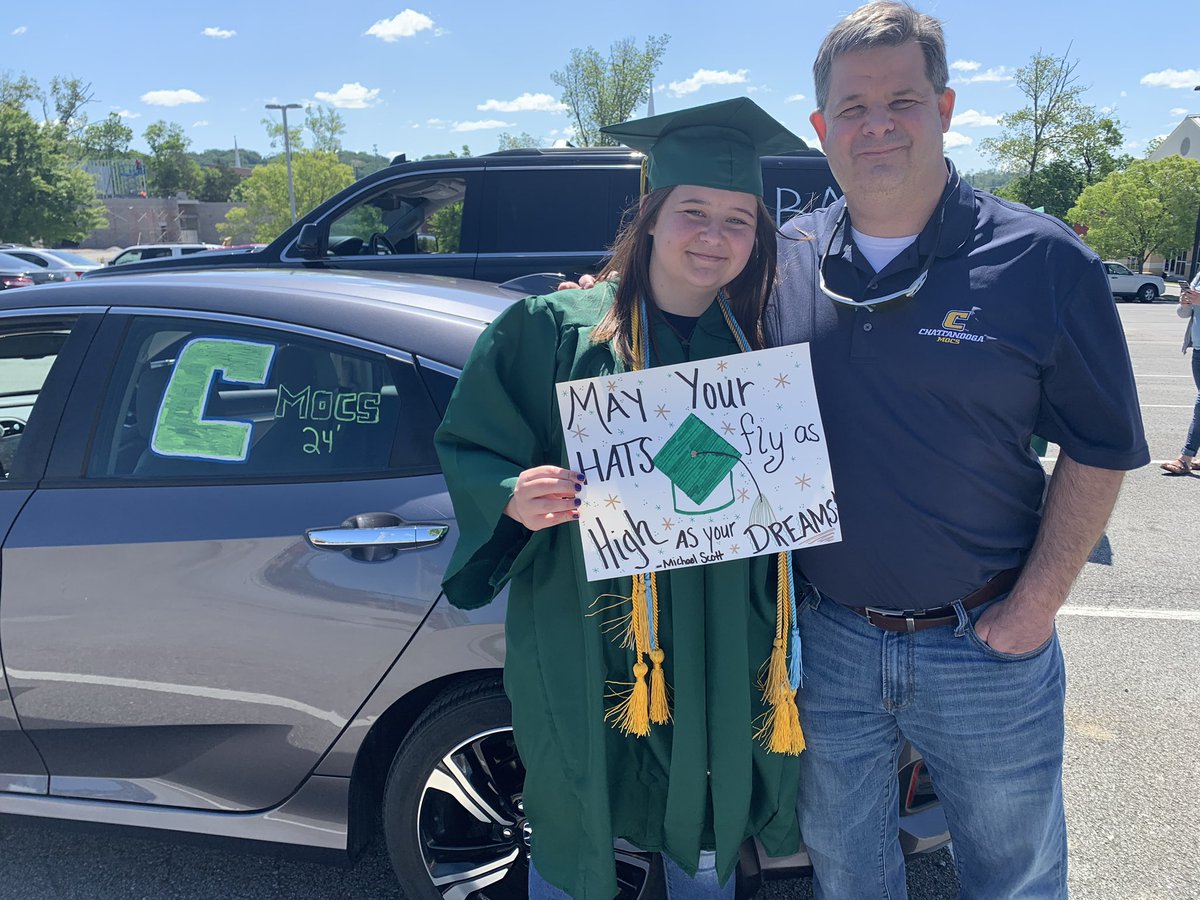 NicoleSuddeth's tweet photo. Her dad surprised her with a special graduation sign during the social distance graduation parade. They both love The Office. #SGN #SomeGoodNews @johnkrasinski @goofy_disneydad #TheOffice https://t.co/sMRHicg99B