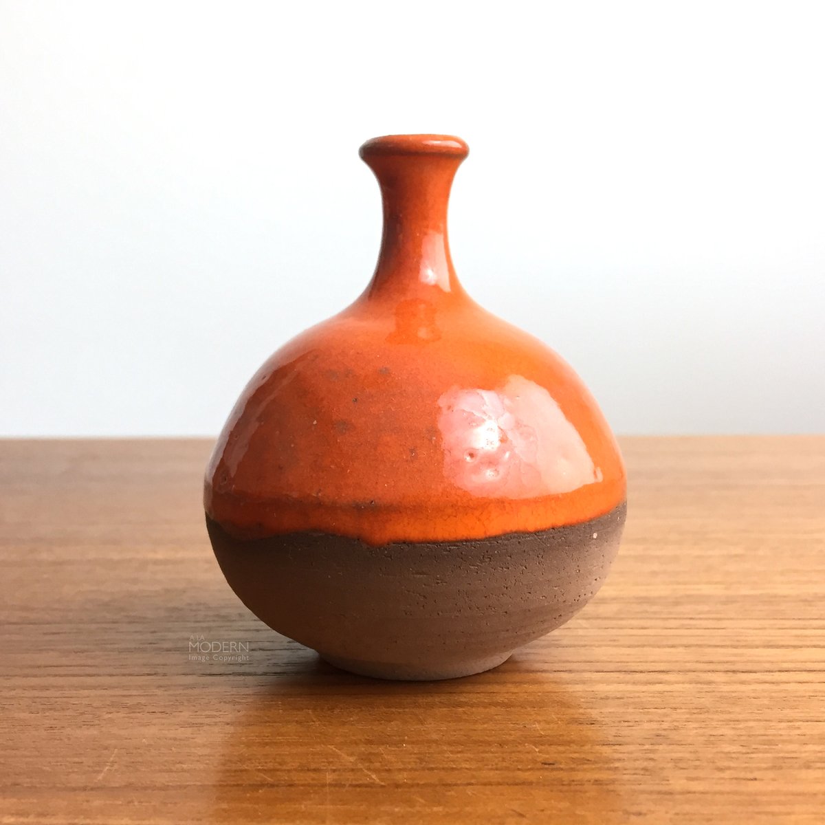 ALaModern's tweet photo. A small studio pottery orange drip glaze weedpot vase, just listed @ALaModern https://t.co/uYQrXjNJcu https://t.co/fCXOsNJLex
