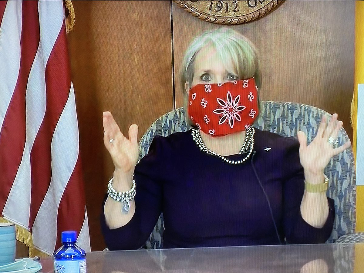 Governor Michelle Lujan Grisham <a href="/GovMLG/">Governor Michelle Lujan Grisham</a> announces gradual reopening of New Mexico (barring NW region), mandates mask-wearing in public, and even demonstrates how to easily make a mask with a bandana and 2 hair ties.