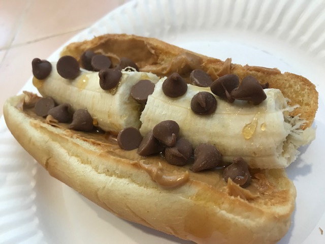 CorpChefLloyd's tweet photo. If you are looking to get a little creative with lunch for the kids, you can't go wrong with the classic #BananaDog - #banana #peanutbutter #hotdogbun #honey #chocolatechips https://t.co/Qhy8IHS2l1