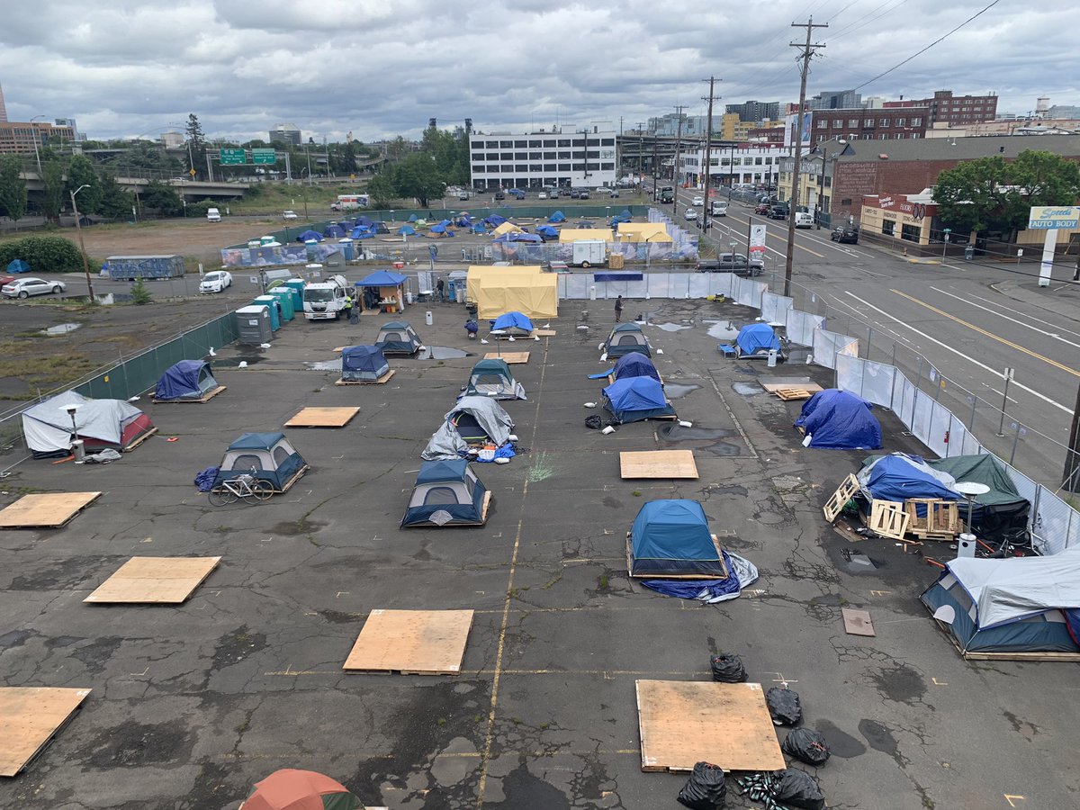 Took this photo while biking to work - Physically distanced tent community in the time of COVID. Please vote yes on measure 26-210 we must do better #housingcrisis #HousingForAll #HousingIsTheCure