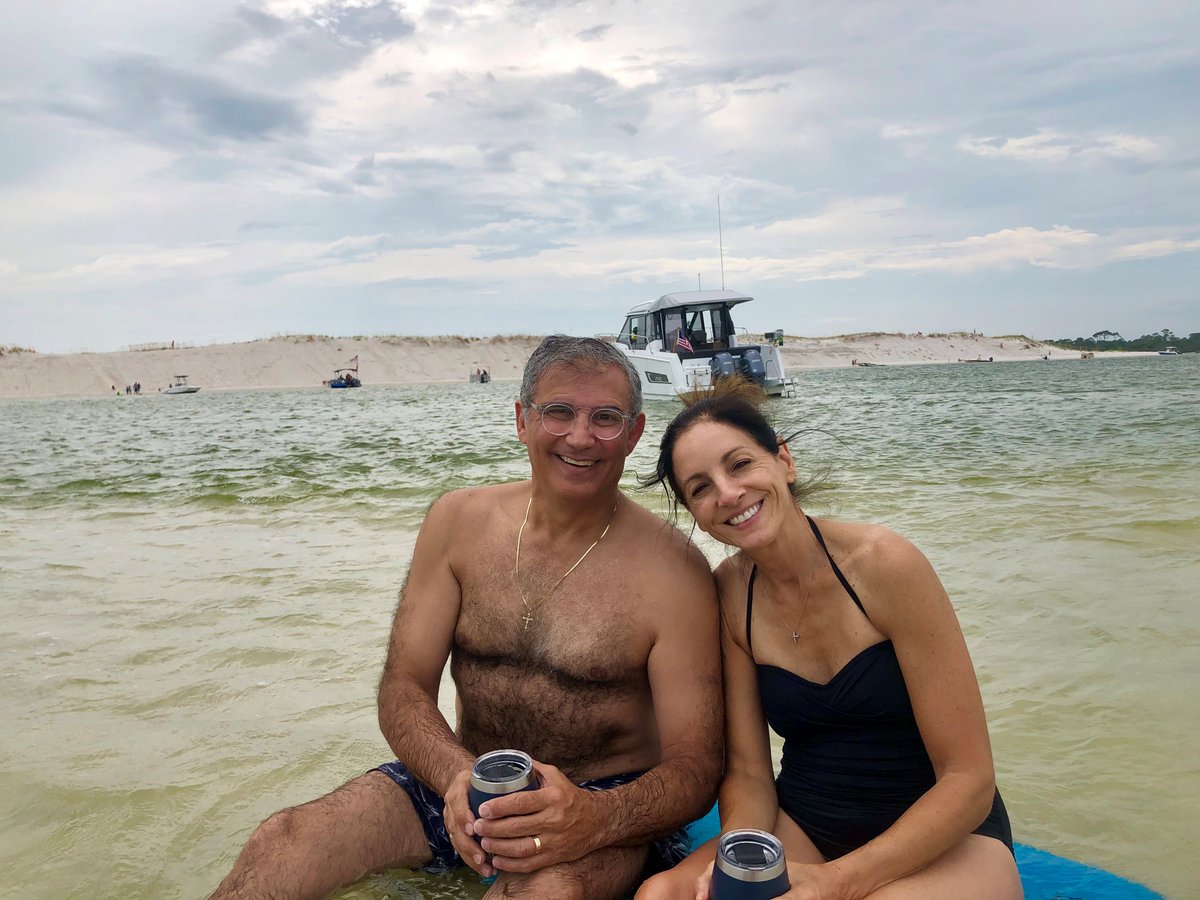 JeanneauAmerica's tweet photo. "My wife, Marlene, and I relaxing on a sandbar in Pensacola Bay, Florida after anchoring off it with our 2019 Jeanneau NC 895." - Tony Santos #jeanneauowners #jeanneaustories #jeanneauUnderway #nc895 #jeanneauoutboard #cabincruiser #weekender #familytime #ilovemyjeanneau #boating https://t.co/vETLlv9scQ