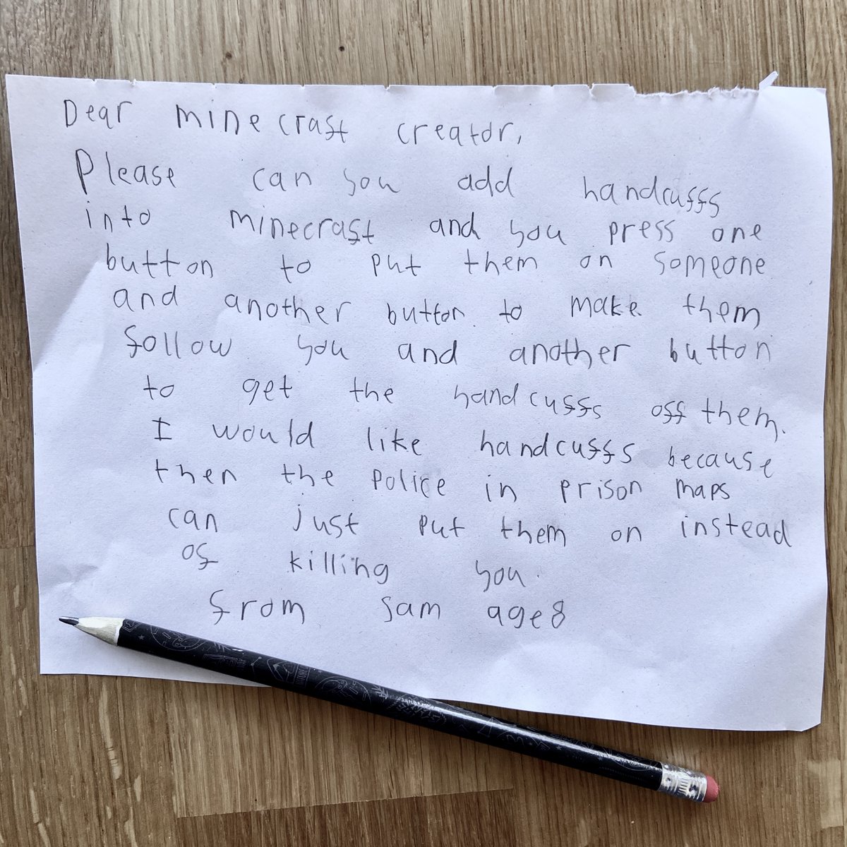 PhilT16's tweet photo. Hey @minecraft, my son's written a letter to you... 

Dear Minecraft Creator,
Please can you add handcuffs into Minecraft and you press one button to put them on someone and another button to make them follow you and another button to get the handcuffs off them. (1/2) https://t.co/0Sw5LAdqHy