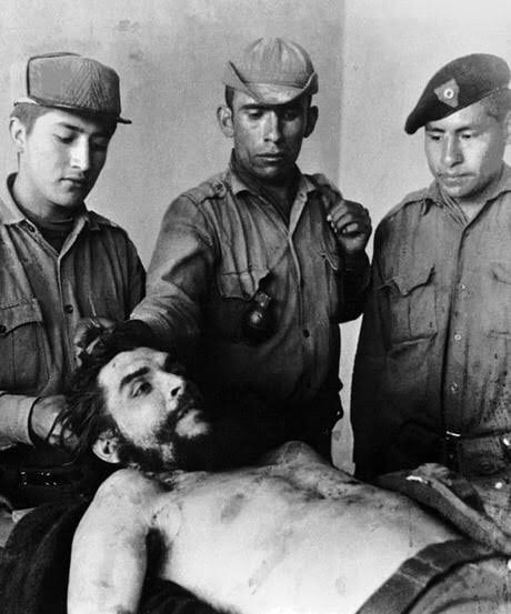 Che was taken to a hidden location, tortured and then murdered. Thereafter, his body was put on public display for viewing. Many saw it as a “christ like visage” and even the Bolivian troops took a photo next to it. This only added to the legend of the man.
