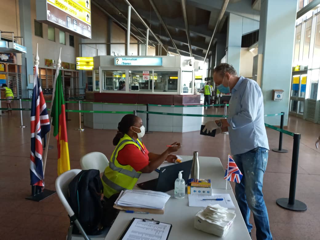 UKinCameroon's tweet photo. Check-in is about to open in 5 minutes and our team is ready to welcome you in - just a quick temperature check from the health officials followed by our visa and passport checks. https://t.co/BfeAWUgC63