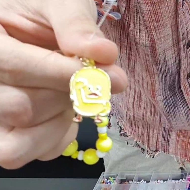  A THREAD OF FRIENDSHIP BRACELETS MADE BY OUR HOBI.This is Jimin’s bracelet. This is the first one he made,he uses black & yellow & a duck pendant that matches in Jimin’s character or style. He made that coz’ for their 8th year of their friendship. So sweet.