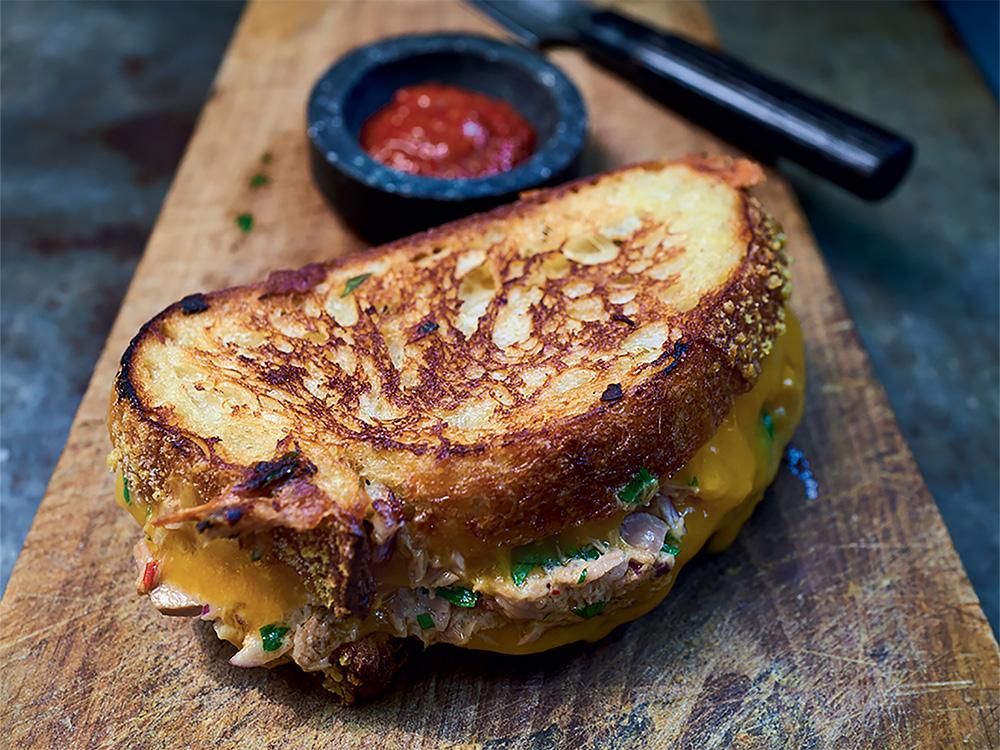 Cook this Tuna melt with ketchup from The Tinned Fish Cookbook