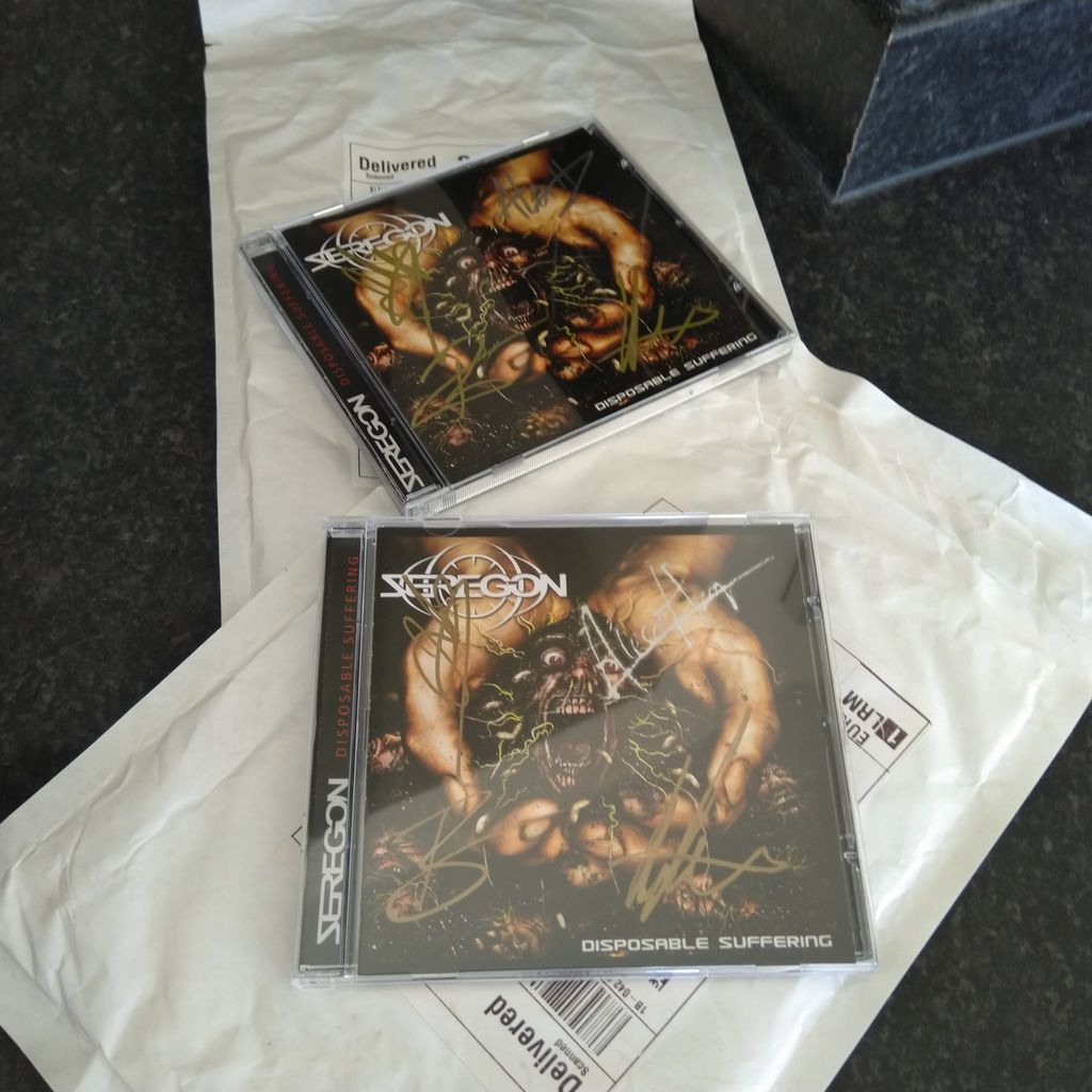 Giveaway! Found 2 signed CDs, who wants em'? Sign below and I'll get them in the post on my next daily exercise adventure ! #freeshit #merch #cds #disposablesuffering