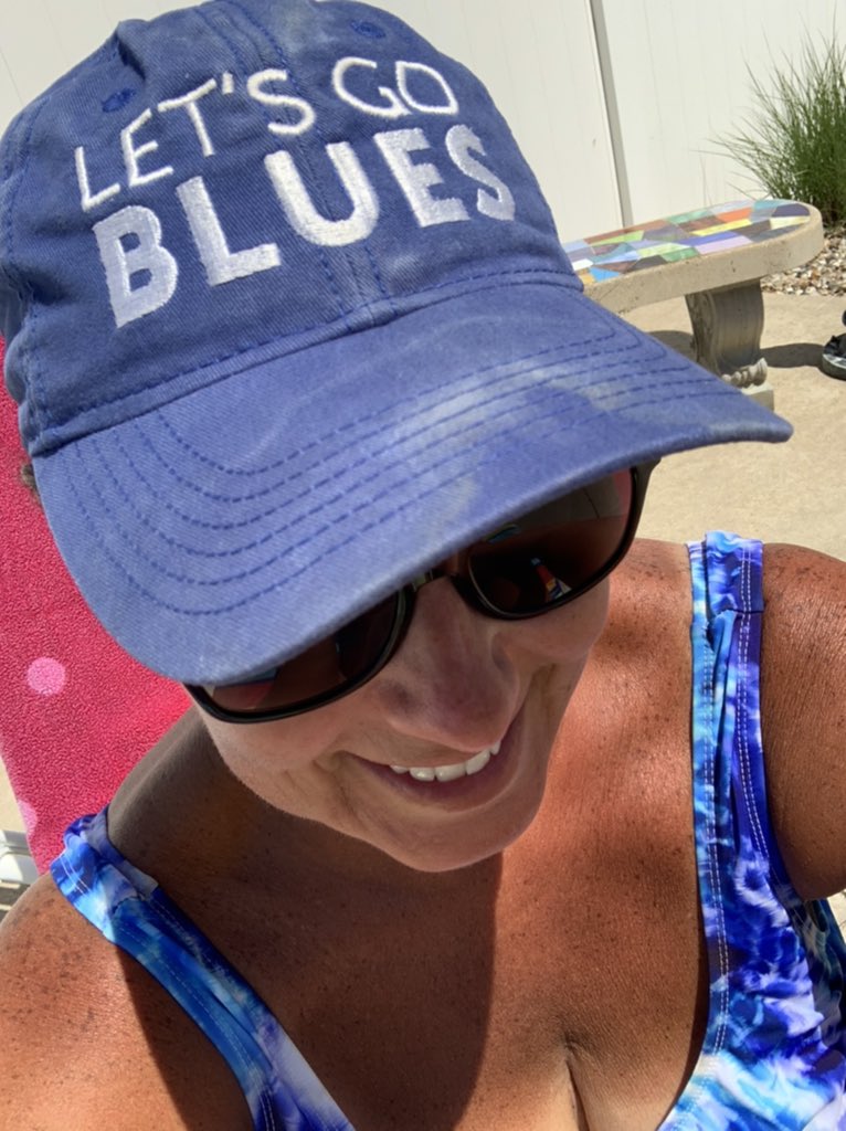 KaranEsch's tweet image. Today’s hat. Covering the skunk stripe gray hair by the pool. The back is my favorite part! (It’s hard to take a picture of the back of your own hat!) #LGB #PoolSideQuarantine @StLouisBlues @ArchApparelSTL