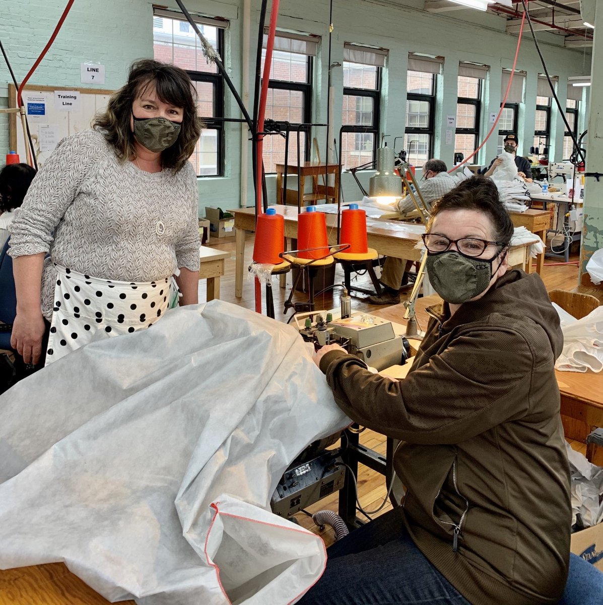 Stanfields1856's tweet photo. Say hello to long-time employee Nancy, who is training one of our many new recruits, Coleen 😊

We've had some AMAZING people join our team over the last few weeks and help make our PPE and Isolation Gowns a reality! ❤️🍁
#COVID19 #TogetherWeCan #ProudlyCanadian https://t.co/pQlUWnB5ox
