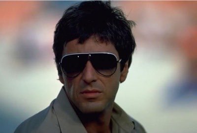 Тони монтана это. Аль Пачино Тони Монтана. Аль Пачино 1983. Аль Пачино Scarface. Аль Пачино лицо со шрамом в очках.