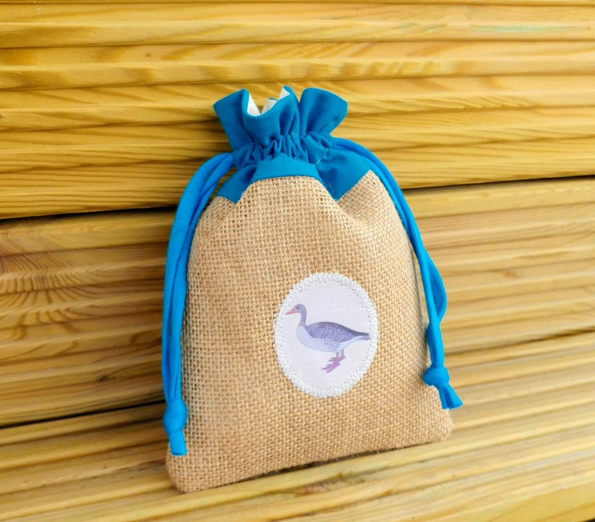 HBoatHeather's tweet photo. 🛄 Reusable greylag goose drawstring bags (with or without water bird food) are now available from wharf emporium. Individually designed bags can also be made to order.

The strong, lined pouches are reusable and hold 200g. ⚖ 
#reusable #hessian #drawstring #bag #pouch #goosebag https://t.co/bqX140p0m9