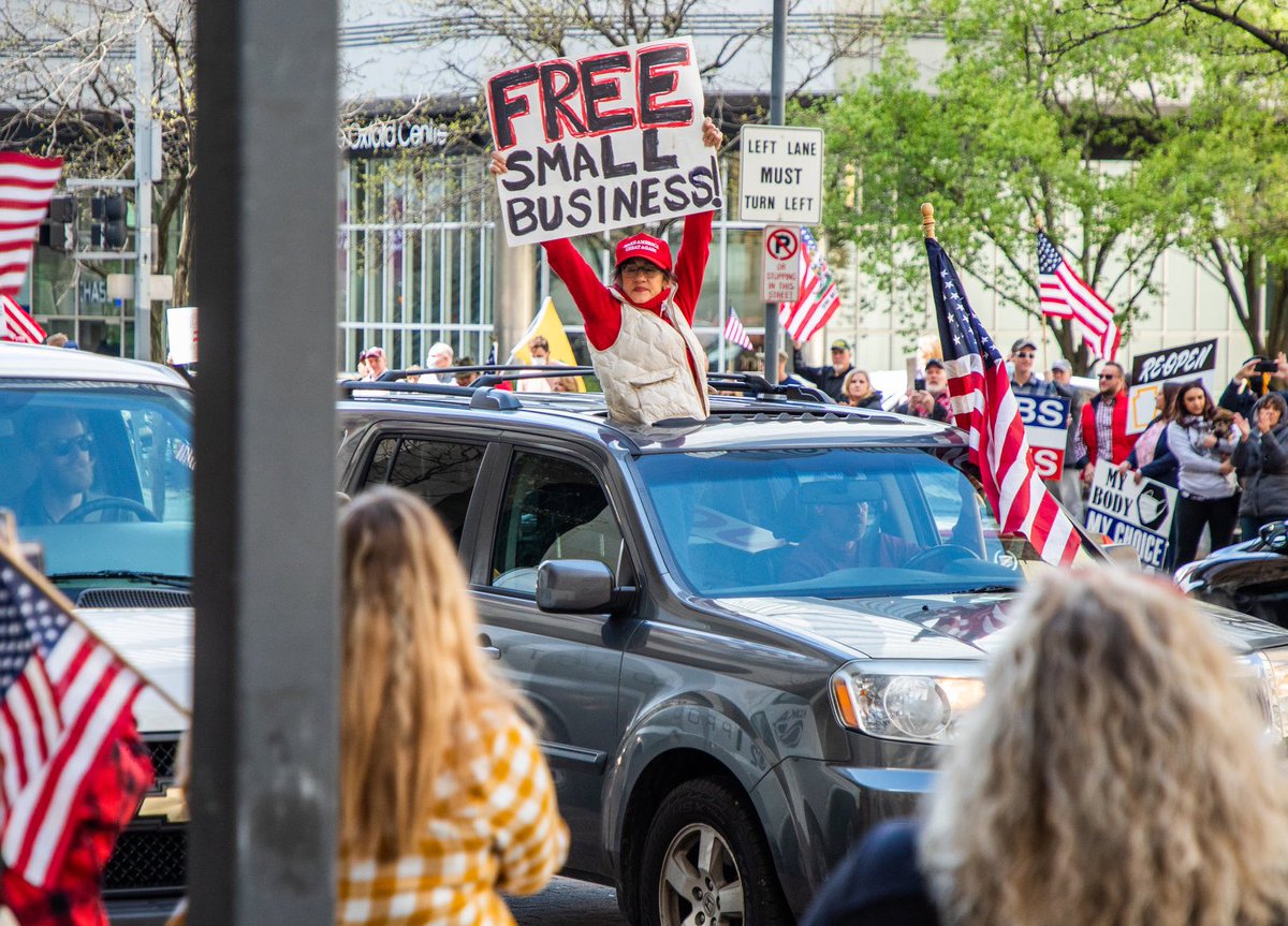 This sign in Pittsburgh was doctored &amp; circulated online to have a Nazi concentration camp slogan. Real photo on the right by photographer Andrew Rush. People are working overdrive to smear all “reopen America” protesters as fascists. When they can’t find them, they create them.