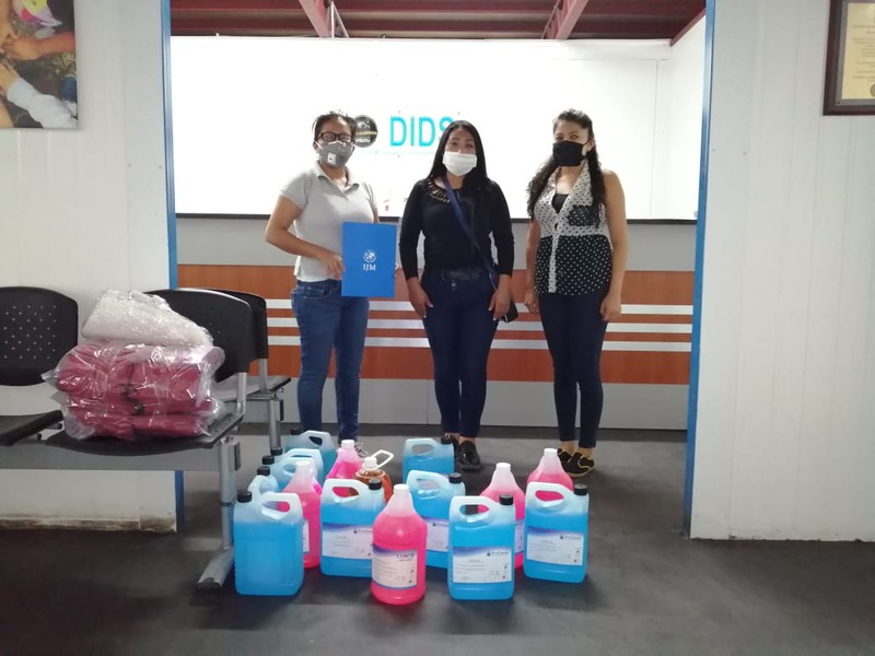 IJM's tweet photo. With violence increasing during #COVID lockdowns, IJM Guatemala donated face masks and disinfecting supplies to help ensure that public officials who are in contact with victims of violence are equipped to protect and serve the most vulnerable. https://t.co/QuzHjimJzo