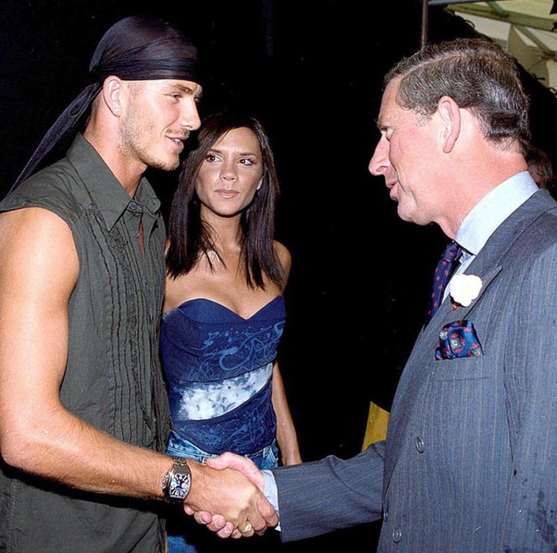 leizenomis's tweet photo. It's David Beckham's birthday today so let's remind ourselves of when he met Nelson Mandela in canerows and met Prince Charles in a durag https://t.co/YqBSXlLFWi
