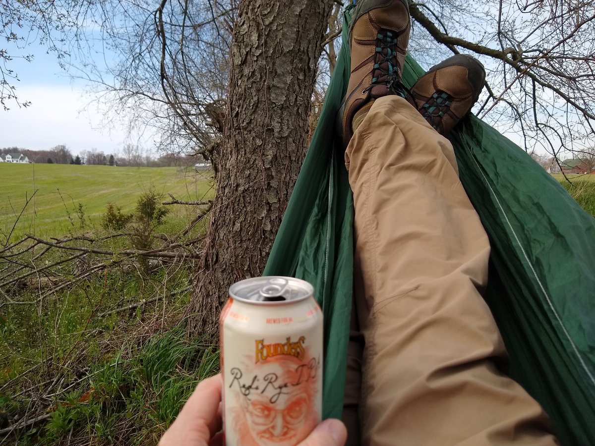 twdrenth's tweet photo. After commitments kept me inside most of the day, I finally have made my way outside. I took a hammock out with me on my walk and set it up on a peaceful spot on the farm.
@foundersbrewing #RedsRye #SocialDistancing #TDadventures #SkyView42 #lollygagging #hammock #MiBeer https://t.co/4Lh0sn0krg