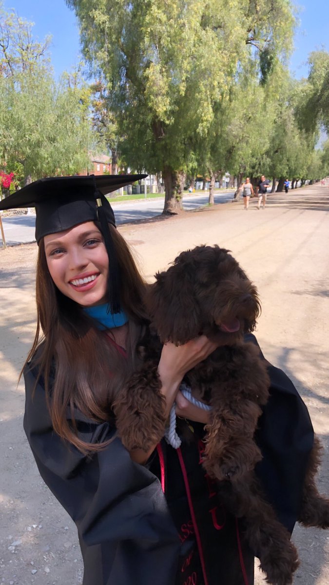 profesoraholton's tweet photo. I was supposed to graduate from APU today with my Masters in Educational Counseling. Instead, I get to walk with my puppy on Euclid in a cap and gown. I’ll take it 🥳 https://t.co/GcGvJjY41W