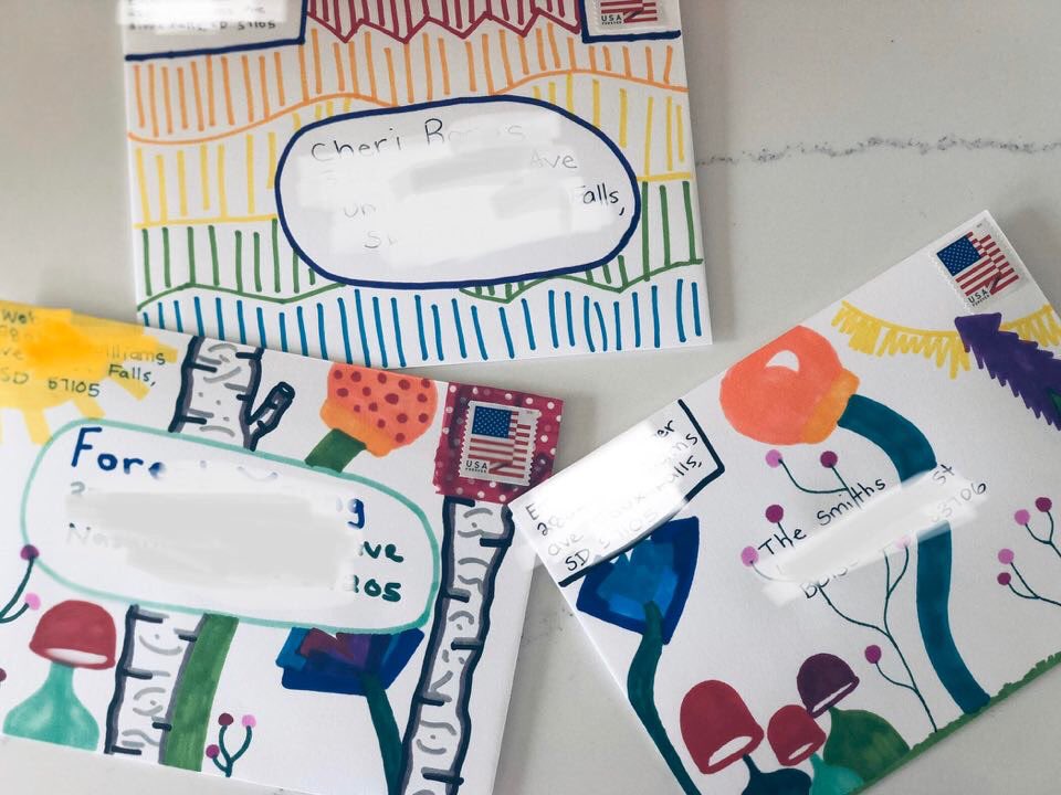 Em has a serious letter writing habit. She maintains active correspondence with over a dozen of her favorite people. And, if you’ve been the lucky recipient of one of Em’s hand decorated letters and envelopes, then you have a pretty good idea of the joy they bring.