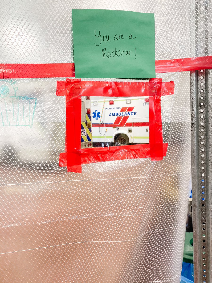 tinamydynski's tweet photo. The fire station looks a little different these days.  Taking all the right measures to be safe. We made some windows so we could say 👋 and  remind them that we are ALL in this together💕 #frontlineworkers #emsstrong #firefighters #pandemic #covid19 #wegotthis 🚑🚒#Fsfd https://t.co/kQ8SzBGfSy
