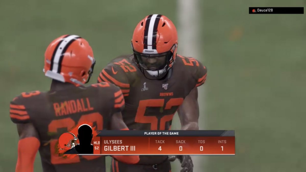 CommishCFA's tweet photo. #CFA Super Bowl V MVP Ulysees Gilbert III is congratulated by D. Randall! Gilbert had 4 solo tackles, 1 pass breakup, &amp; a huge INT to stop a Saints drive. First year starter Gilbert topped off a 7 INT regular season by adding 4 more in the playoffs. Guy is clutch! @Ulysees_G5 https://t.co/ZYwdG4gUeC