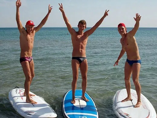 Apart from the obvious of course.Pics of guys paddle boarding in speedos. #...