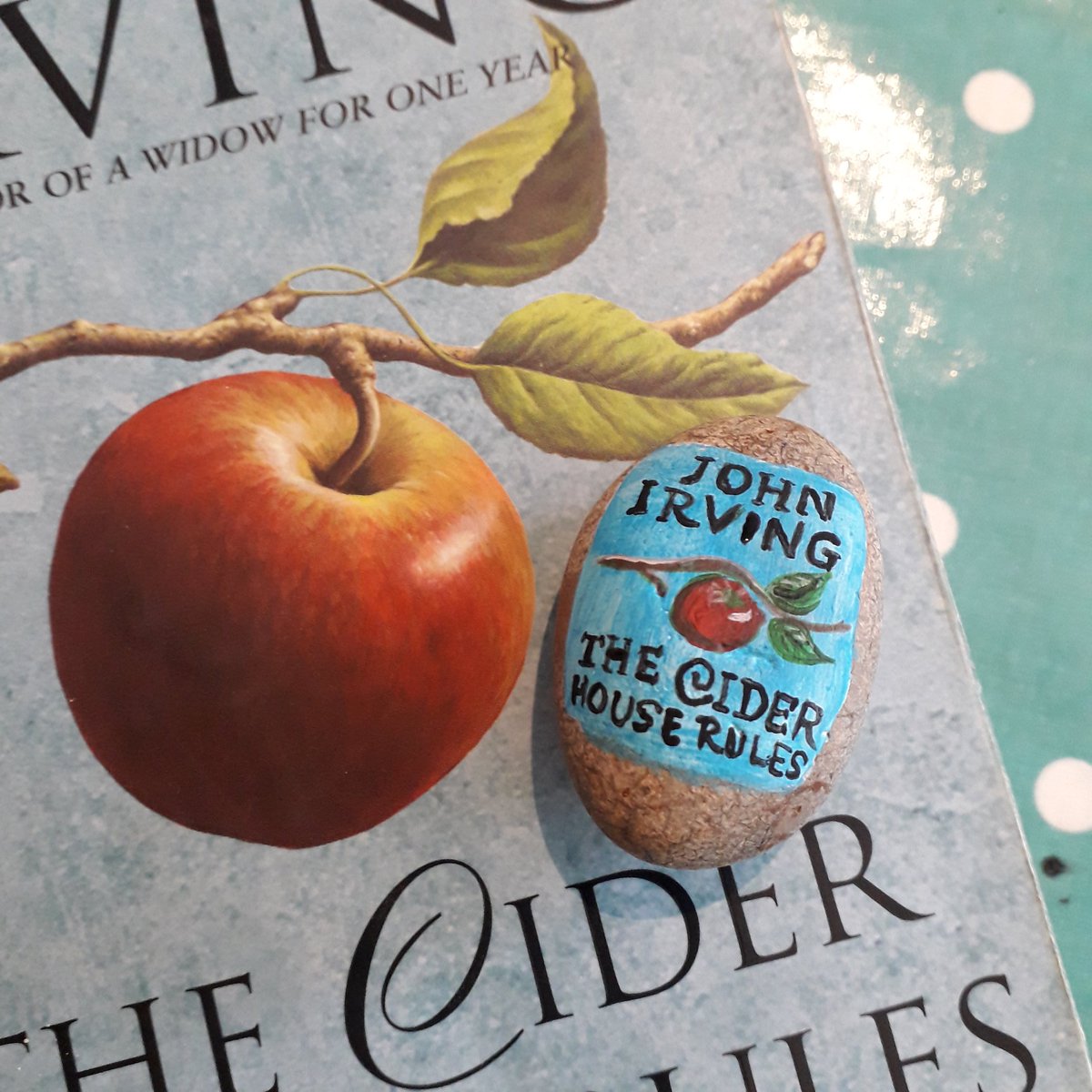 These are getting smaller and smaller... The Cider House Rules by John Irving, on a pebble.