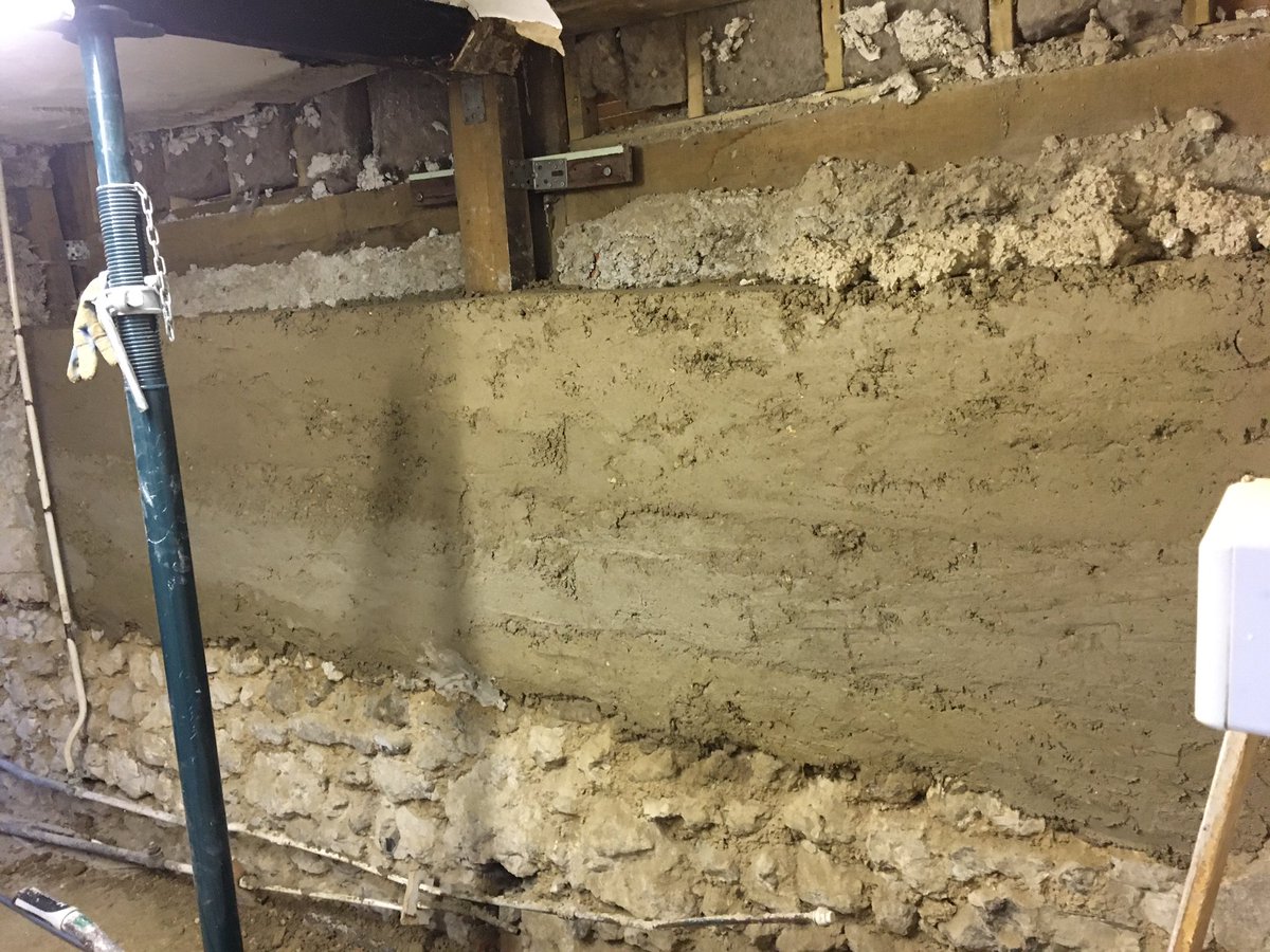 SellickCon's tweet photo. In a Tudor Dorset cottage (before lockdown) - Original chalk cob was very unstable and failed. Cob was remixed and used in layers to reinstate wall. Reed laths used to repair ceiling. #conservationbuilding https://t.co/0lyekJVc7E