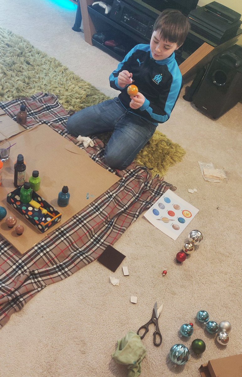 Rotmm's tweet photo. @CampionScience @Campion_School Lucas in Maple 7 and dad had fun on the Solar System project, turning some old Christmas baubles into planets, and old chalk board into the Solar System and a kitchen bowl wrapped in crepe paper with a light inside to make the Sun #ProudToBeCampion https://t.co/ChUGLqoVc1