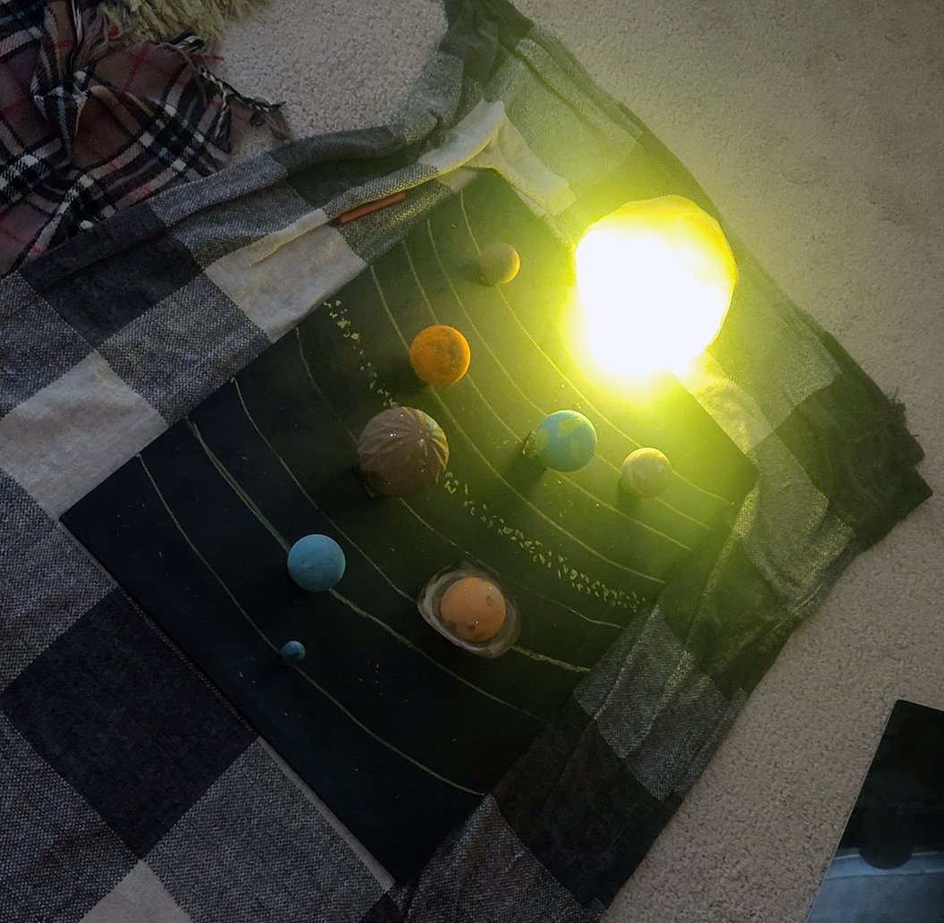 Rotmm's tweet photo. @CampionScience @Campion_School Lucas in Maple 7 and dad had fun on the Solar System project, turning some old Christmas baubles into planets, and old chalk board into the Solar System and a kitchen bowl wrapped in crepe paper with a light inside to make the Sun #ProudToBeCampion https://t.co/ChUGLqoVc1