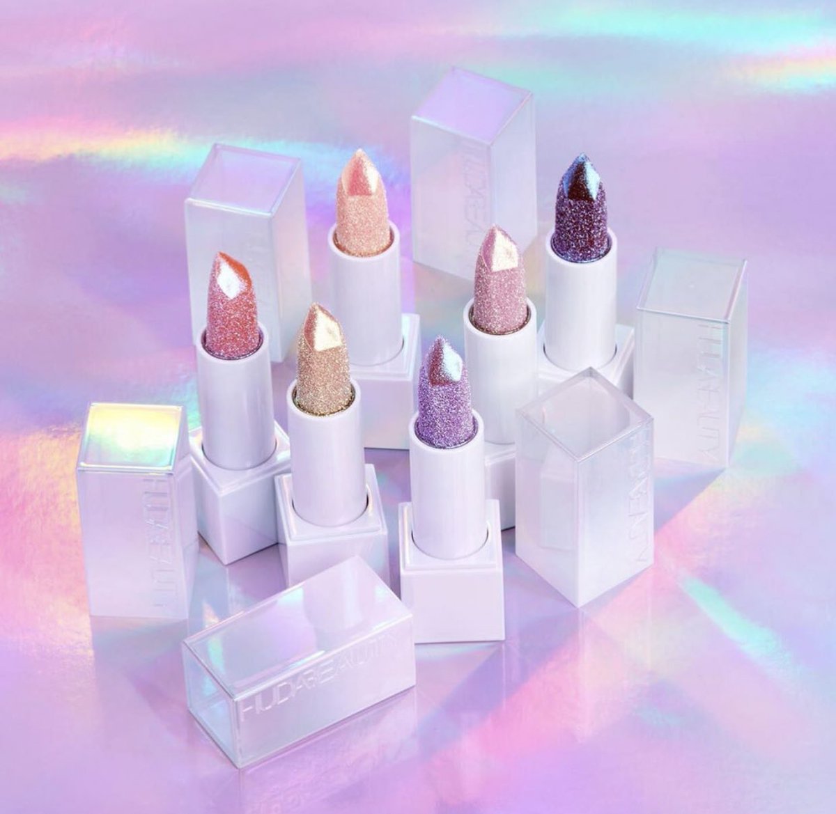 Trendmood's tweet photo. Available Now! 🚨 online @hudabeauty The NEW!!! ✨ Diamond Hydrating Lip Balms 💄💎 Have a diamond-like sparkle and a mix of rich emollients including mango seed butter to soften lips, leaving them pillow like and supple $25 each https://t.co/9kUeW2SGwV