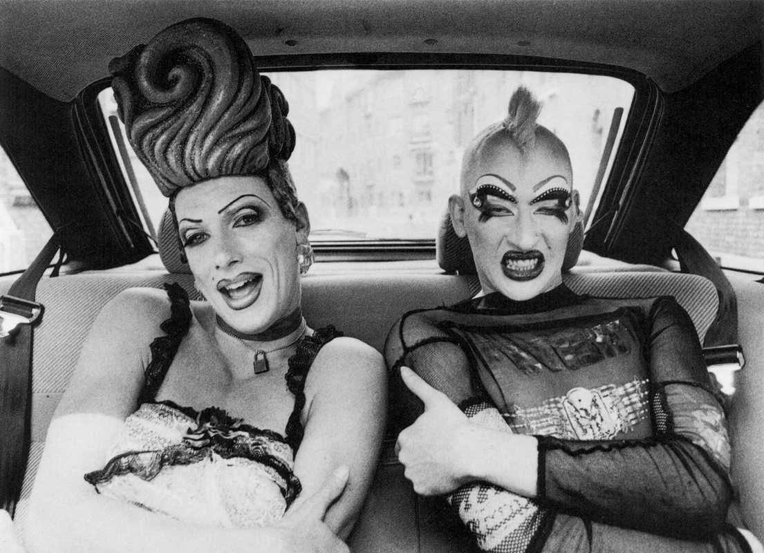 toiida's tweet photo. Jeanette Jones, โJason + Garry in a Freedom Car going to see Jasonโs mumโ, 1994, from book โA Walk on the Wild Sideโ โข https://t.co/MeAgilfev8 #queerart #queerphotography #blackandwhitephotography #queerculture #dragculture #drag #clubbin #freedomcar #JeanetteJones #rhyme #1990s https://t.co/4AjHxwFHWw