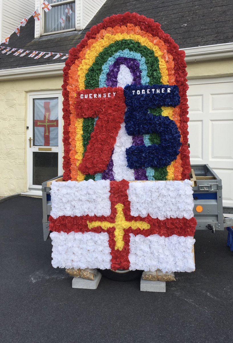 This superb ‘75th Liberation Guernsey Together’ was made by our daughter and her family and now has pride of place in front of our house for others to enjoy.  Their float makes a nice addition to our bunting and flags.  Decorate to Liberate 🇬🇬🌈 #GuernseyTogether