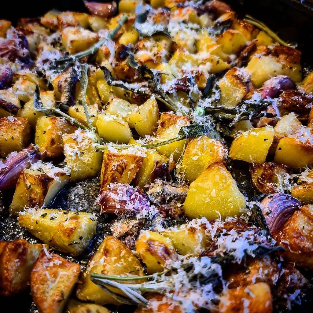 JBMoreton's tweet photo. @unday roast potatoes, with an Italian twist; garlic, rosemary, sage, anchovies and parmesan. Went beautifully with confit pork belly, asparagus and peas with pancetta. @chefjbmoreton @chefvicci @hidehouseglos #sundayroast #isolation #isolationcreation #… https://t.co/IbPKZ6yW3z https://t.co/fO5f8LEZnT