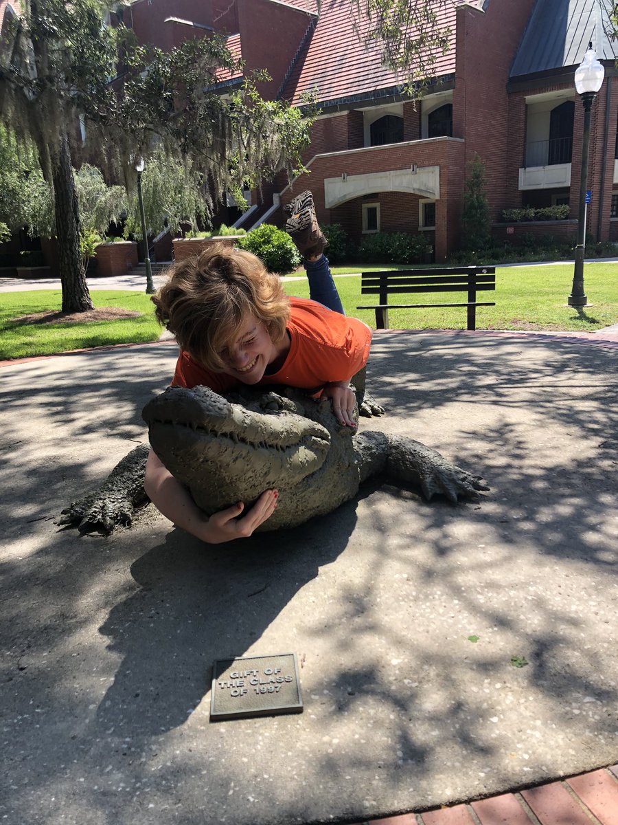 TaylorHenley29's tweet photo. Since I couldn’t graduate today here is my roommate wrestling a gator. Go Gators 🐊 https://t.co/a7TLCWLuOe