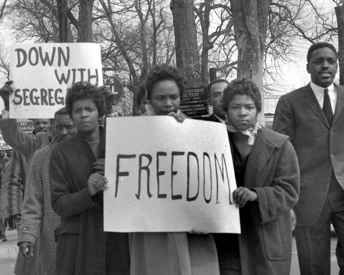 CornellWBrooks's tweet photo. My mother dressed up to protest segregation. THEN police used water hoses to rip &amp; ruin her clothes .

She &amp; other young people asserted power with clothes worn with dignity, not guns carried in fear.

Patriot protesters dressed in camo look so weak compared to this generation. https://t.co/pvCvLB7YgJ