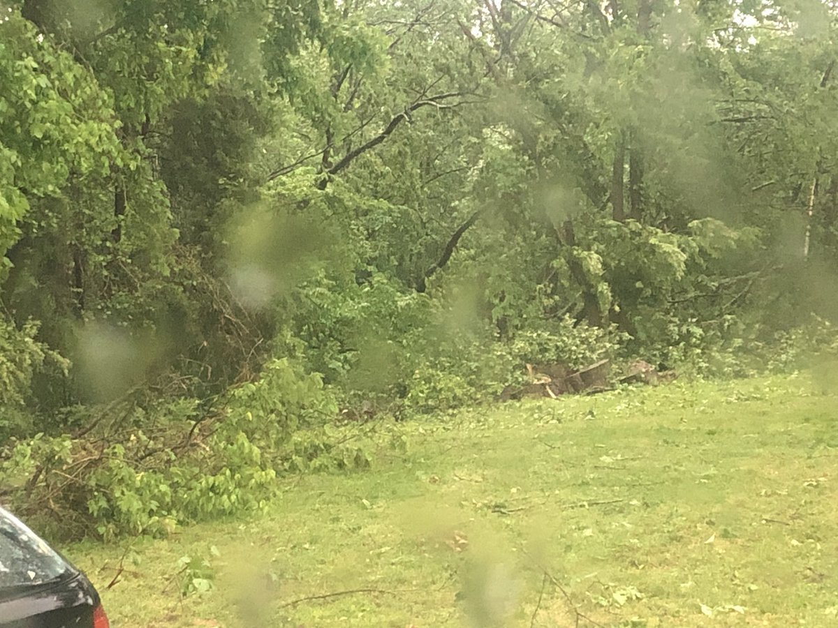 lomaesocks's tweet photo. @NashSevereWx the carports from the parking spot across from our house all flew into the air on top of one another and lots of trees down https://t.co/omzW8EAomn