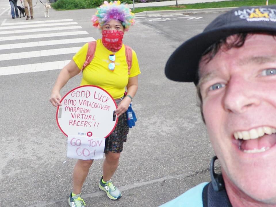 debrakato's tweet photo. BMO Vancouver Marathon Marathon Brooks 'Run Happy' Scavenger Hunt photo! Here I am with my homemade BMO cheer sign and I'm the cheer team for Jon! I'm also wearing my previous @BMOVanMarathon race shirt! 
@BrooksRunningCA
#RunHappyRunVan #bmovm #cheerteam #BrooksRunHappy https://t.co/E20XYoN6cr
