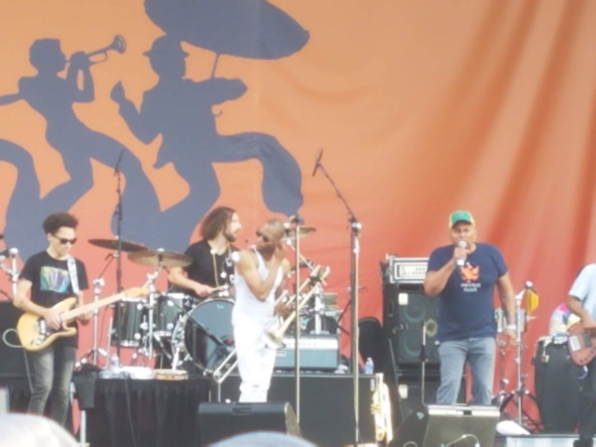 unc8689's tweet photo. Listening to the Neville Brothers close out #jazzfestinplace on @wwoz_neworleans is so bittersweet. Been a gorgeous weekend listening by the pool in SC, but so hard not to be there as planned. Here's Aaron Neville singing with Trombone Shorty during last year's closing set. https://t.co/qw7RV90XKH
