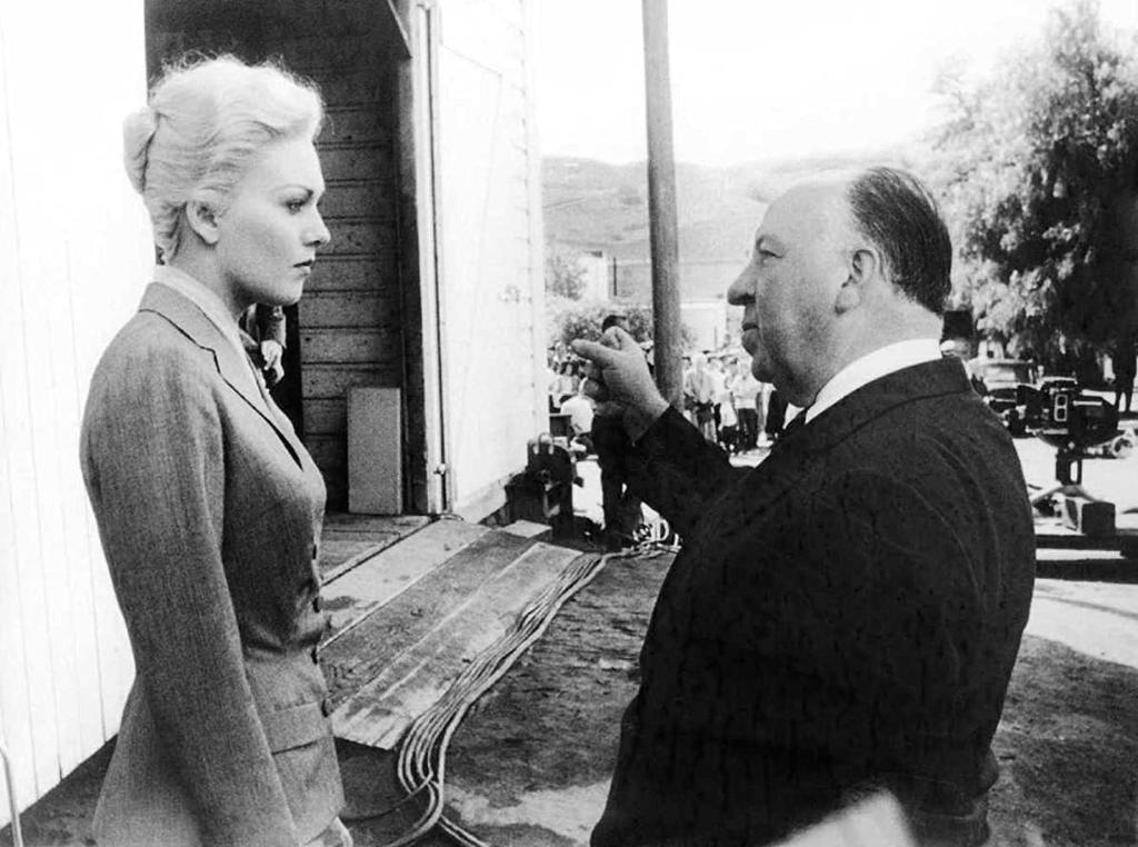 IMDb's tweet image. Behind the scenes with Kim Novak and Alfred Hitchcock in Vertigo (1958)