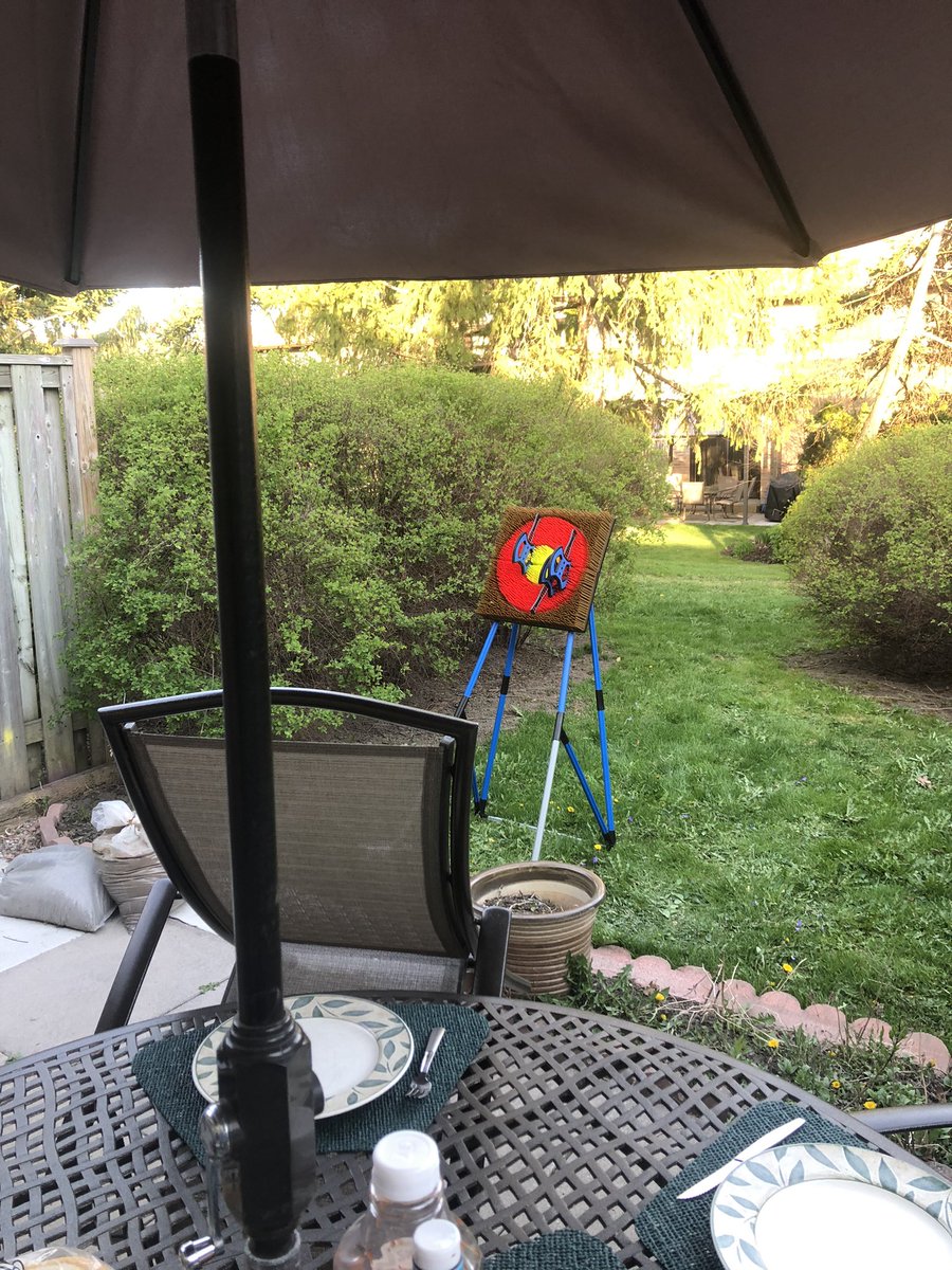 Axe throwing in the backyard.